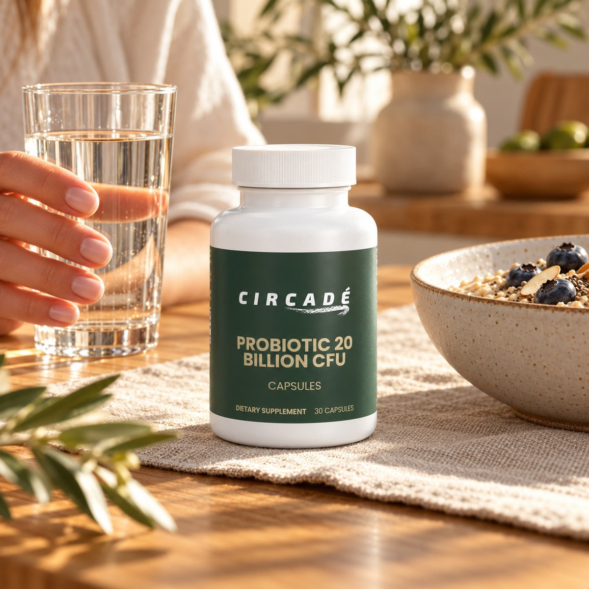 Circade Probiotic 20 Billion beside breakfast and a glass of water